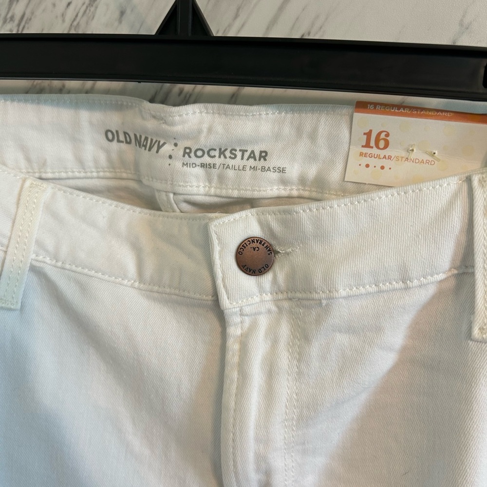 NWT old navy white (small rips) jeans- mid rise